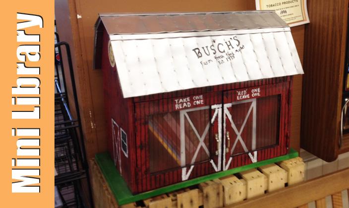 A barn style mini library made by the Carleton Rotary