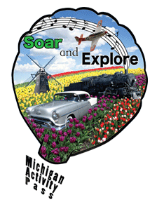 Hot air balloon with classic car, tulips, and windmill