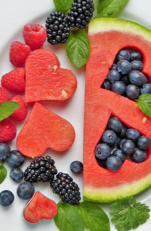 watermelon and blueberries shaped like hearts