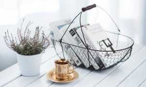 Basket with plant and tea cup