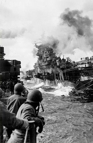 WWII photo of battleship sinking
