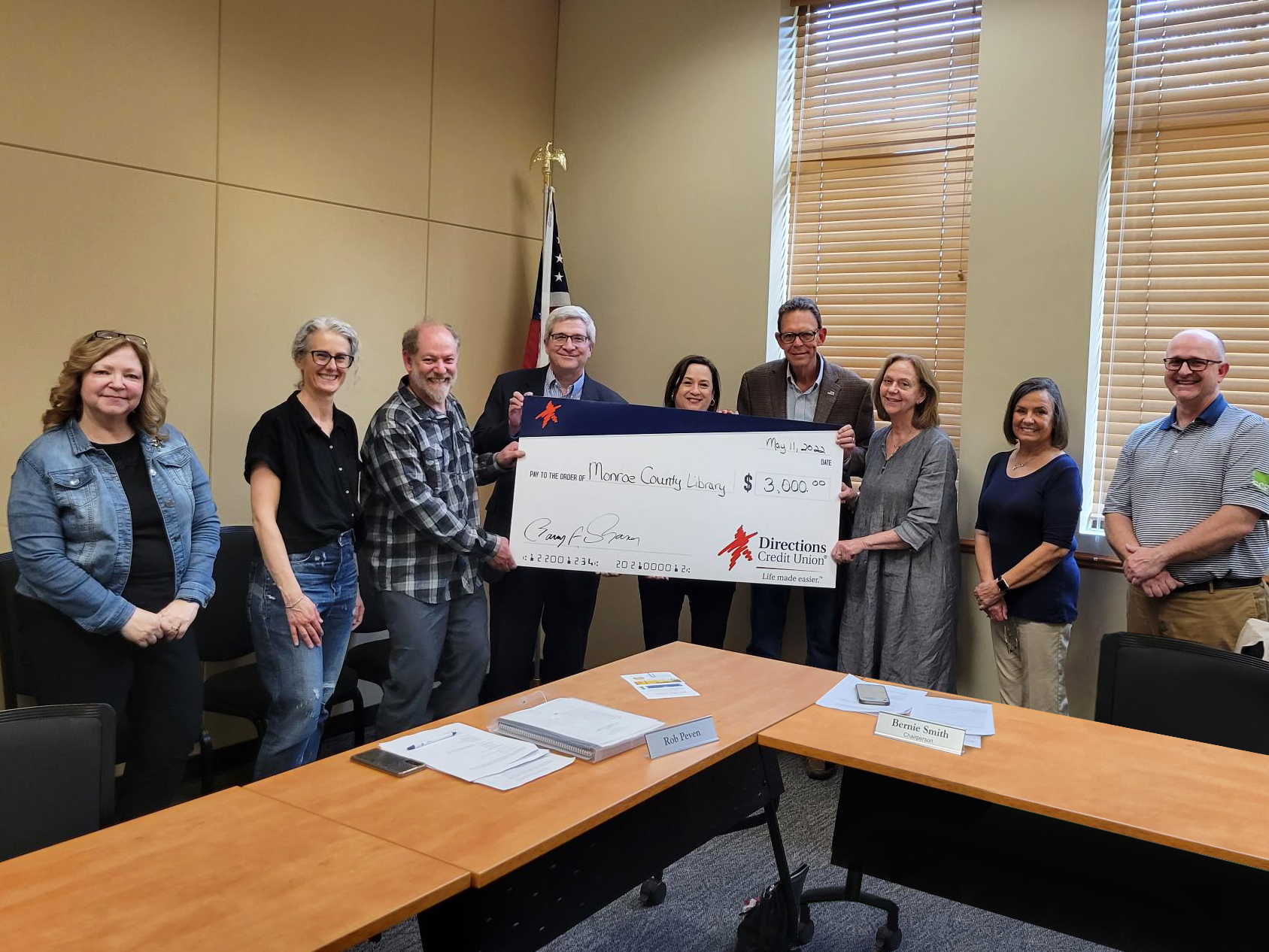 Directions Credit Union presents check to MCLS Board