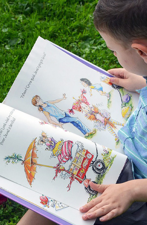 Child reading a picture book